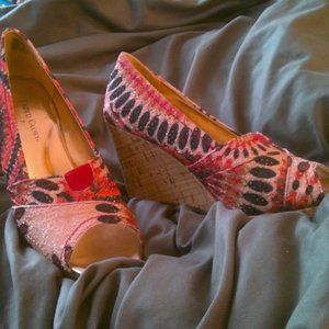 Beautiful pair of wedge shoes.